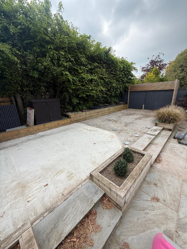 Garden-room foundation and steel-frame erection in Surrey